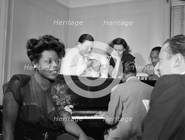 Portrait of Mary Lou Williams, Jack Teagarden, Dixie Bailey...Mary Lou Williams' apartment, NY, 1947 Creator: William Paul Gottlieb.