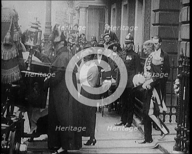 The Duke of York and Lady Elizabeth Bowes-Lyon Emerging from a House and Embarking on a..., 1920. Creator: British Pathe Ltd.
