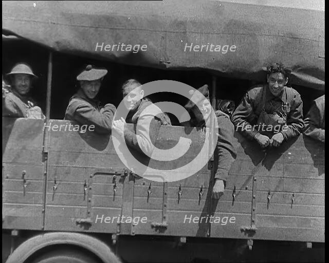 French Military Vehicles and Soldiers Crossing the Belgian Frontier To Take up Defensive..., 1940. Creator: British Pathe Ltd.