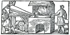 Using bellows to increase the draught in a furnace, 1540. Artist: Unknown