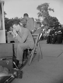 Photographers from the Negro press at Howard University commencement..., Washington, D.C, 1942. Creator: Gordon Parks.