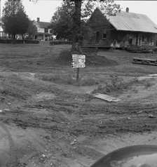 Crossroads hamlet after a rain, Culbreth, Granville County, North Carolina, 1939. Creator: Dorothea Lange.