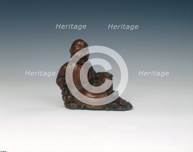 Reclining boxwood luohan figure, Qing dynasty, China, 18th century. Artist: Unknown