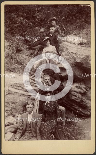 Group portrait on hillside, about 1880-1895. Creator: Unknown.