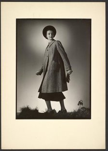 Woman modeling coat, early 1940s. Creator: Gunther Krampf.