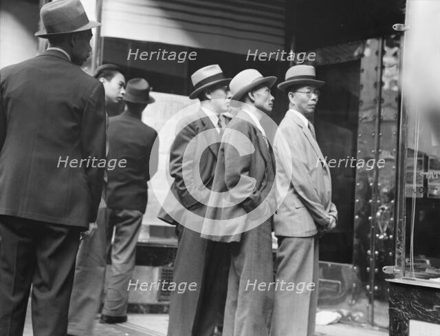 News of the surrender of Canton..., San Francisco, California, 1938. Creator: Dorothea Lange.