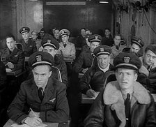 American Flying Boat Pilots Watching a Briefing in Iceland, 1943. Creator: British Pathe Ltd.