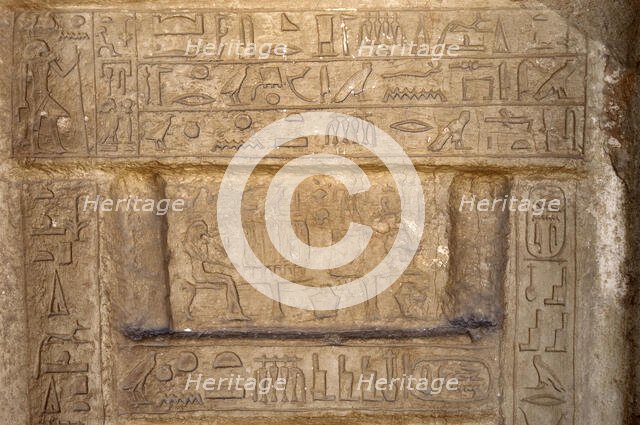 Hieroglyphic writing and deceased ofering food to the gods, Necropolis of Saqqara, Egypt, 2003. Creator: Unknown.