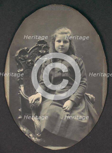 [Girl with Ringlets, Seated, Three-Quarter Length], 1890s. Creator: Frederick Gutekunst.