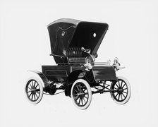 Northern Manufacturing Company automobile, front-quarter view with top, between 1900 and 1910. Creator: William H. Jackson.