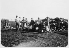 Soldiers of the French Foreign Legion stacking logs, Syria, 20th century. Artist: Unknown