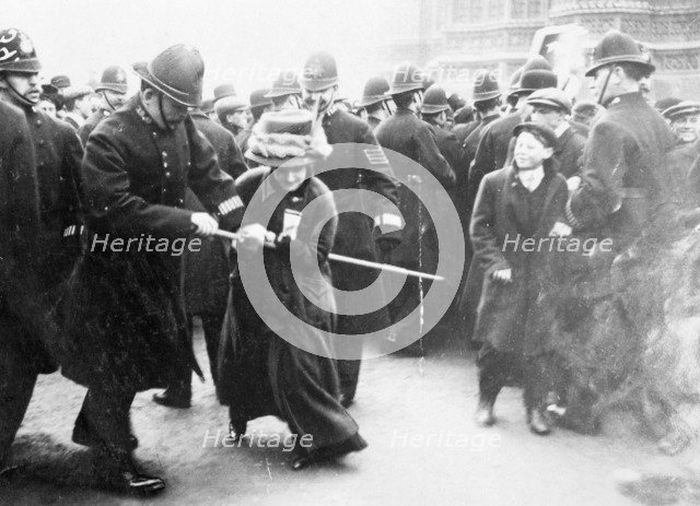 A suffragette struggling with a policeman on 'Black Friday', 18th November 1910. Artist: Unknown