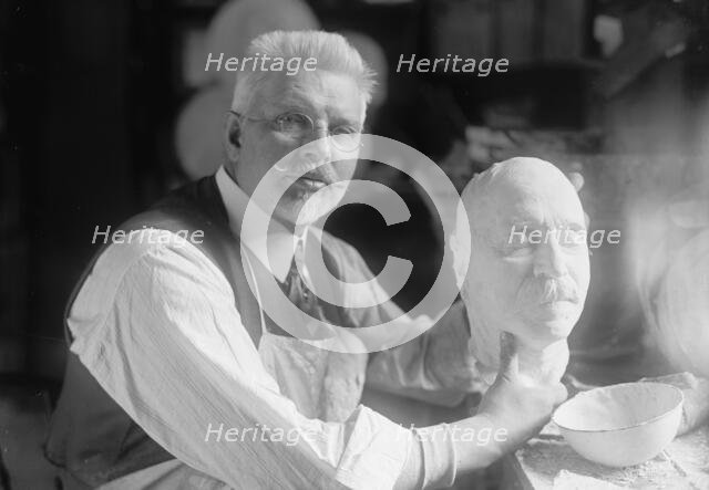 U.S.J. Dunbar with Death Mask of Admiral Dewey, 1917. Creator: Harris & Ewing.