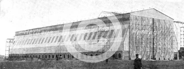 The Home Of "Zeppelin I": The Newly Built Air-Ship Shed..., Near Metz, 1909.  Creator: Reclam.