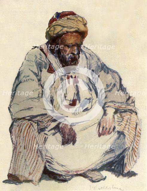 'Seated Figure of Syrian Shepherd in Sheepskin Coat', 1902. Creator: John Fulleylove.