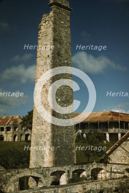Ruins of an old sugar mill and plantation house, vicinity of Christiansted, Saint Croix, V.I., 1941. Creator: Jack Delano.