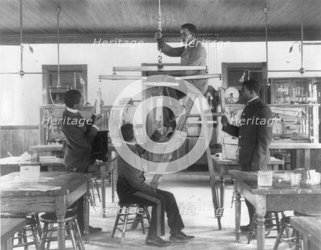 Hampton Institute, Va. 1899 - Classroom scenes - testing combined draught of animals, 1899 or 1900. Creator: Frances Benjamin Johnston.