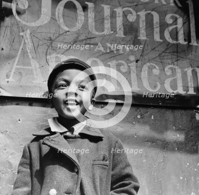 Harlem newsboy, New York, 1943. Creator: Gordon Parks.