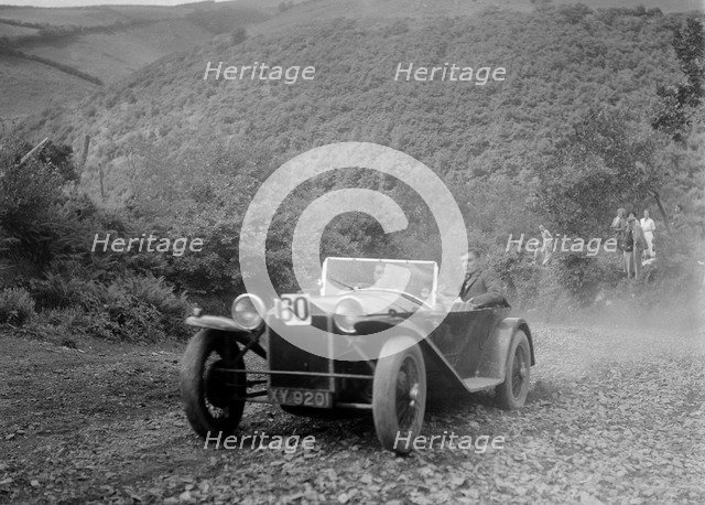 Lancia Lambda open tourer at the Mid Surrey AC Barnstaple Trial, Beggars Roost, Devon, 1934. Artist: Bill Brunell.