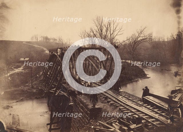 Part of Construction Corps Building New Military Truss Bridge Across Bull Run, April 1863. Creator: Egbert Guy Fowx.