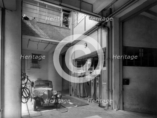 Stepney Carrier Co Ltd, 94-100 St John Street, Islington, London, c1935. Artist: Herbert Felton