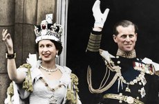 Thumbnail image of Queen Elizabeth II and the Duke of Edinburgh on their coronation day, Buckingham Palace, 1953. Artist: Unknown.
