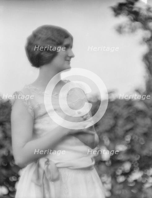Conroy, Frank, Mrs., standing outdoors, 1923 Creator: Arnold Genthe.