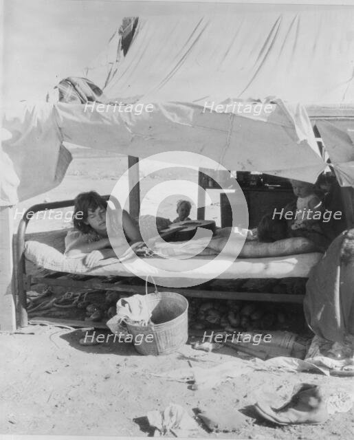 Oklahoma potato picker's family encamped on the flats near Shafter, California, 1935. Creator: Dorothea Lange.