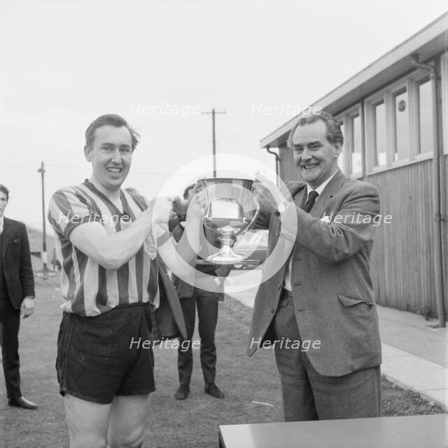 Peter Hipkin, captain of the Laing Sports Club's 1st football team, 27/04/1963. Creator: John Laing plc.