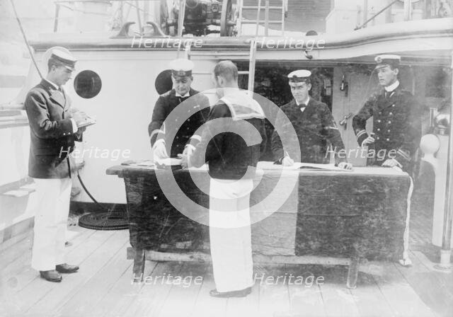 Paying sailors, British Navy, between c1910 and c1915. Creator: Bain News Service.