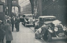 'Customs Officers Examining Motor Cars at Southampton', 1937. Artist: Unknown.