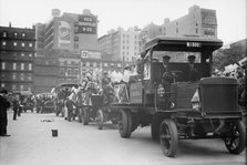 Orphans going to Coney Island in Autos, 1911. Creator: Bain News Service.