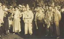 People at Rickmansworth, Herts, some in drag, gather outside at a swimmming gala, 1908. Creator: Unknown.