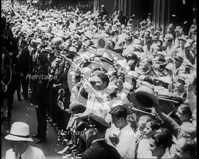 Crowd Watching a Procession, 1933. Creator: British Pathe Ltd.