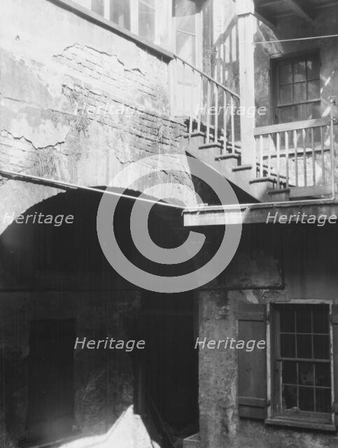 Courtyard, New Orleans, between 1920 and 1926. Creator: Arnold Genthe.