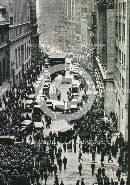 Stock market crash of 1929 in New York, people expecting on the sidewalks of Wall Street in front…