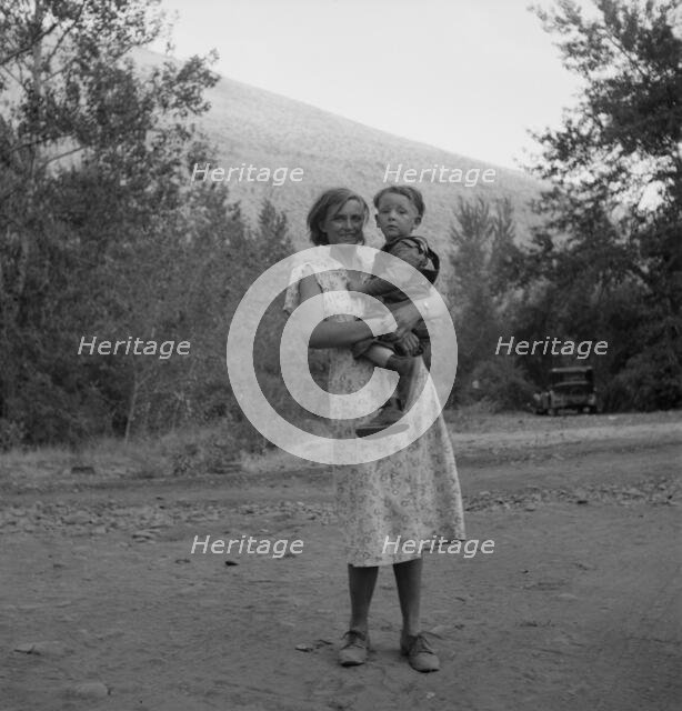 Champion hop picker in squatter camp before the season opens, Washington, Yakima Valley, 1939. Creator: Dorothea Lange.
