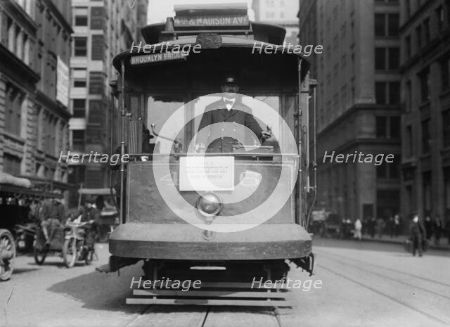 Clean Up day -- street car -- 4th and Madison Ave., 1914. Creator: Bain News Service.
