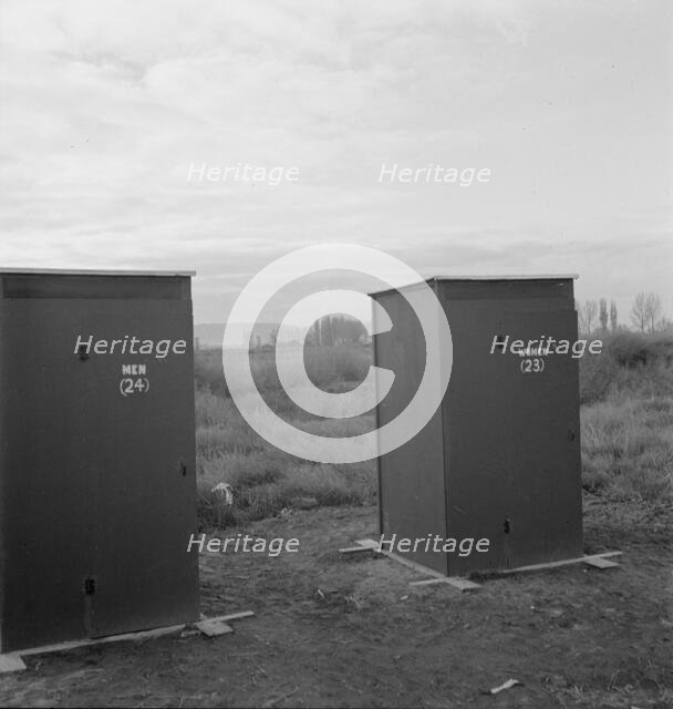 Twenty-four portable toilets, mobile camp (FSA), equipment, Merrill, Klamath County, Oregon, 1939. Creator: Dorothea Lange.