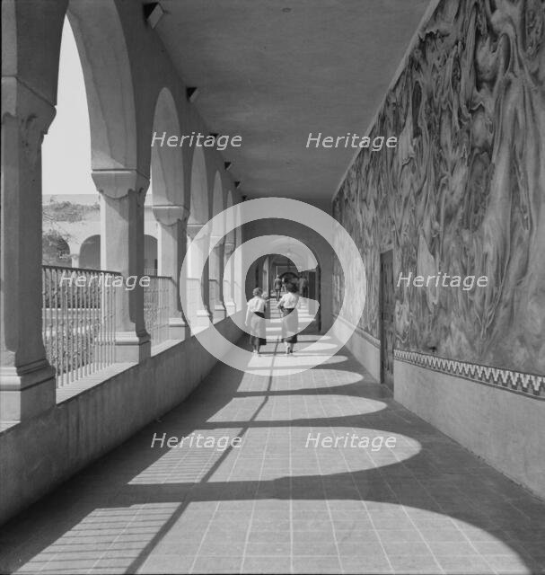 High school showing part of Federal Art Project mural decoration, Fullerton, California, 1937. Creator: Dorothea Lange.