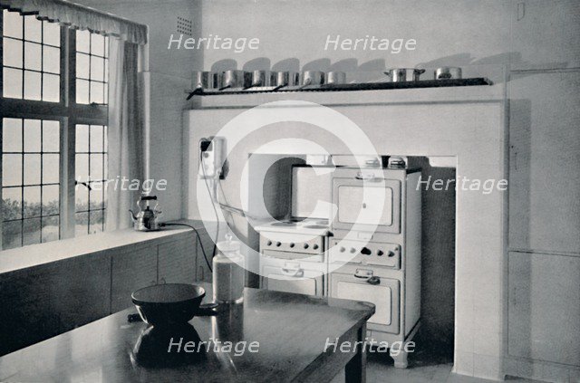 'Kitchen designed by R.W. Symonds', 1938. Artist: Unknown.