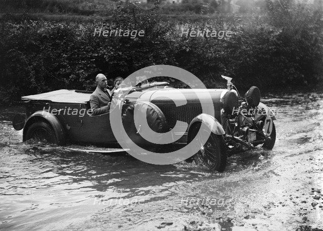 3-litre Lagonda of RD Tong fording the River Exe at Yealscombe, Devon, JCC Lynton Trial, 1932. Artist: Bill Brunell.