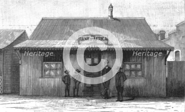 ''On the way to the Transvaal Gold Fields; The Bank of Africa, Johannesburg; as it was...1887',1890. Creator: Unknown.