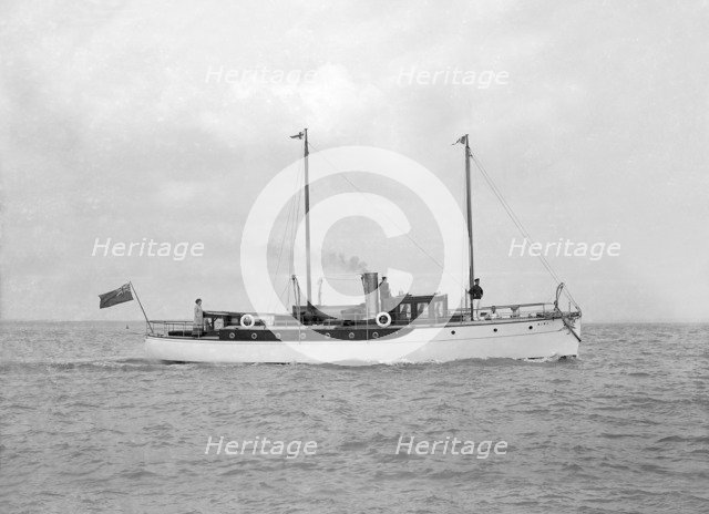 The 23 ton motor yacht 'Kiwi' under way, 1914. Creator: Kirk & Sons of Cowes.