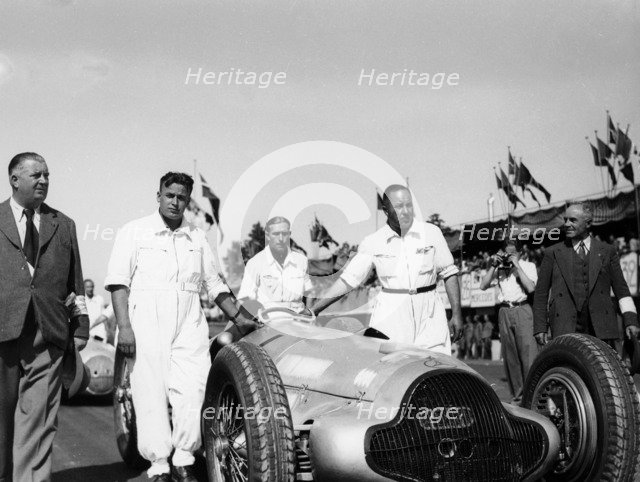 Alfred Neubauer with Mercedes car at the Start of the Italian Grand Prix, Monza, 1938. Artist: Unknown