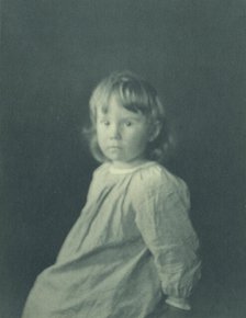Seated girl with body facing left looking at the camera, c1900. Creator: Myra Albert Wiggins.