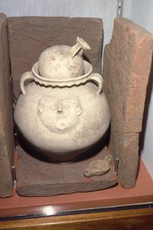 Roman Burial (Cremation) in a face urn, Colchester, Essex c125-200. Artist: Unknown.