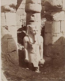 Colossal Statue of Ramesses II in the First Court of the Temple at Luxor, 19th century. Creator: Zangaki.