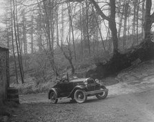 Kitty Brunell driving a 1930 2-seater Ford Model A, 1931.   Artist: Bill Brunell.