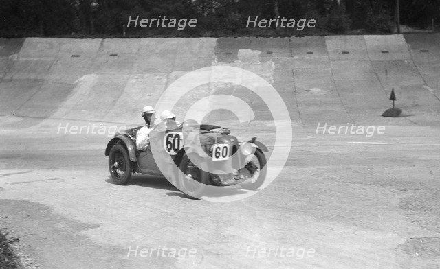 MG C of the Earl of March and CS Staniland, winner of the JCC Double Twelve race, Brooklands, 1931. Artist: Bill Brunell.
